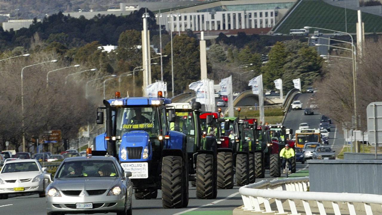 Fair Dinkum Food Campaign Rally in Canberra, Tassie tractors head to the tractor muster point prior to the start of the rally