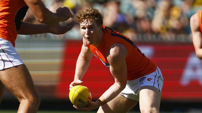 Greater Western Sydney’s Tom Green gets a handball away during Round 2 in 2022.