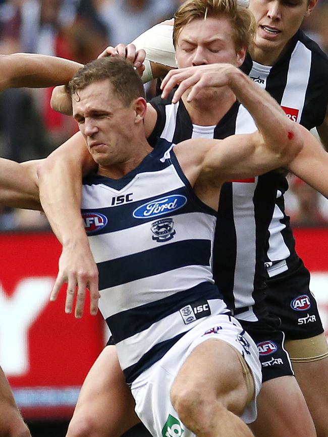 Jordan De Goey collects Selwood around the neck. Picture: Colleen Petch