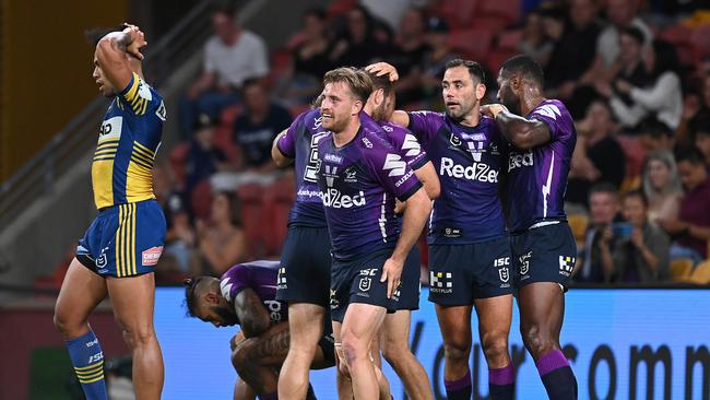 The Storm celebrate a try against the Eels.