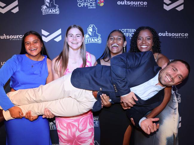 Eta Sikahele, Takoda Thompson, Savannah Roberts-Hickling, Phoenix-Raine Hippi with Aaron Booth at the Gold Coast Titans NRLW 2025 Season Launch at Isoletto The Star Gold Coast. Picture, Portia Large.