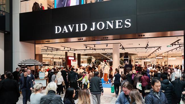 Customers check out the new look David Jones store at The Glen.