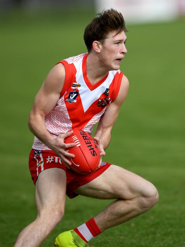 Corey Battams racks up another possession for Karingal on Saturday. Picture: Andy Brownbill