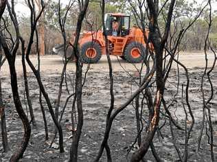 Earthmoving equipment in Deepwater after the fires swept through the region. Picture: Mike Knott BUN051218DEE1