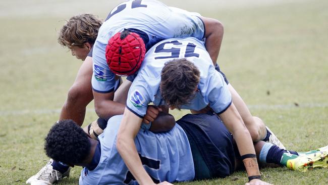 Ofa Latu, Jack Kalms and Samuela Sorovi for the Waratahs.