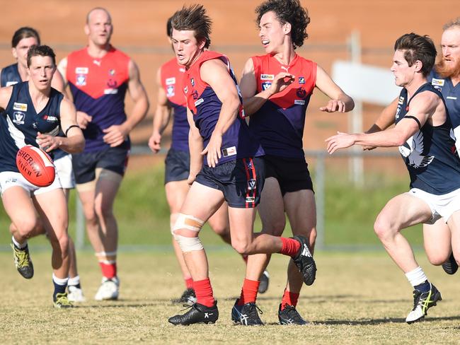 Action from an eventful game between Mt Eliza and Edi-Asp at Emil Madsen Reserve on Saturday. Picture: Chris Eastman