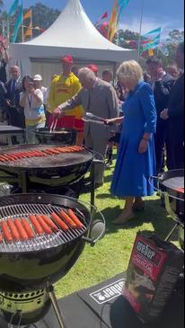 King Charles III and Queen Camilla serve up some snags