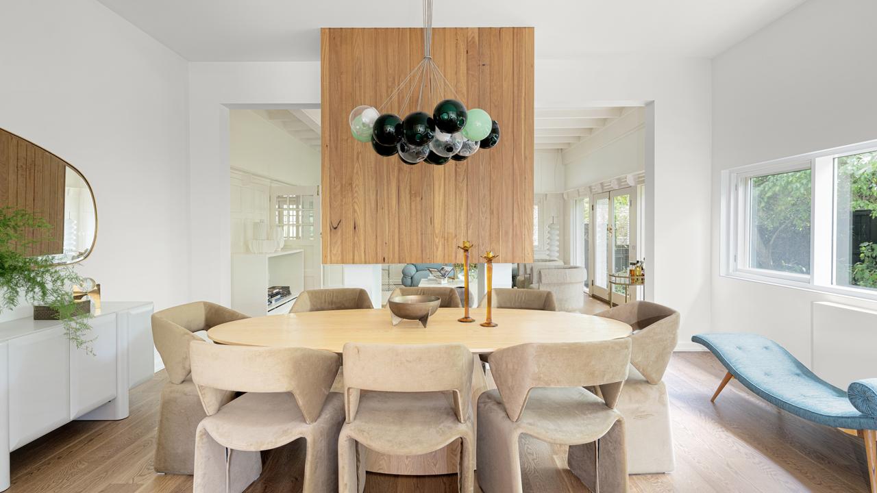 A creative light fixture rounds out the dining area.