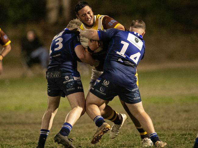Zechariah Tupulua is tackled by Brothers players (No.13 Lachlan Squires, No.14 Zach Nuttall). Picture Julian Andrews.