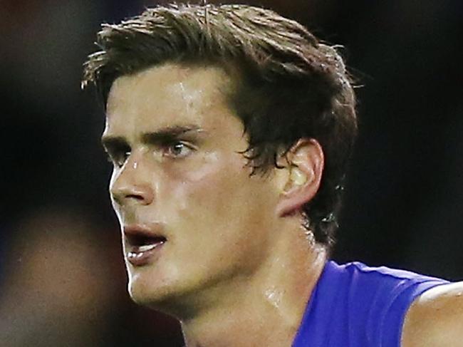 MELBOURNE, AUSTRALIA - APRIL 26: Tom Boyd of the Bulldogs celebrates a goal during the round four AFL match between the Western Bulldogs and the Adelaide Crows at Etihad Stadium on April 26, 2015 in Melbourne, Australia. (Photo by Michael Dodge/Getty Images)