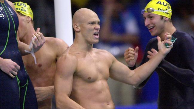 Klim and Ian Thorpe celebrate after breaking the men's 4x100 freestyle relay world record to win gold at the Sydney 2000 Olympic Games. Picture: Darren England/ALLSPORT