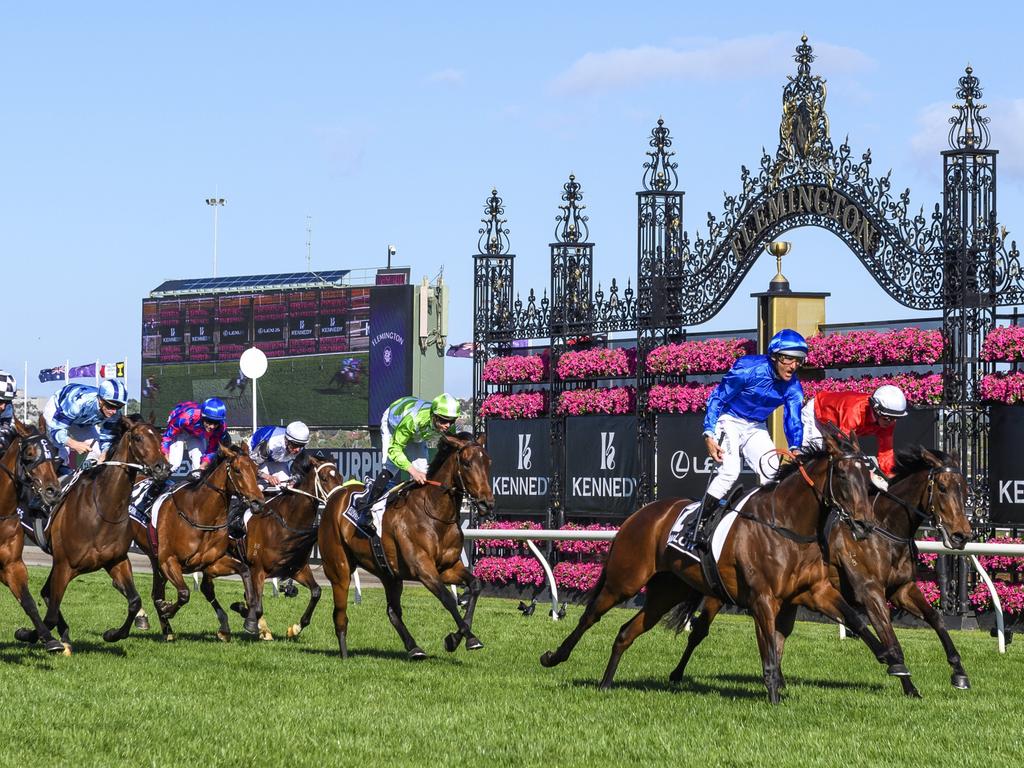 MELBOURNE, AUSTRALIA - NOVEMBER 04: Damien Oliver riding Willowy winning Race 8, the Kennedy Oaks, during 2021 Oaks Day at Flemington Racecourse on November 04, 2021 in Melbourne, Australia. (Photo by Vince Caligiuri/Getty Images)