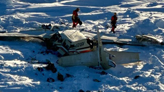 The Bering Air Caravan was carrying nine passengers and one pilot on board when it crashed southeast of Nome, Alaska. Picture: US Coastguard/AFP.