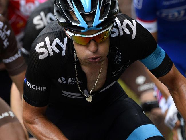 Australia's Richie Porte rides in the pack during the 161.50 km tenth stage of the 101st edition of the Tour de France cycling race on July 14, 2014 between Mulhouse and La Planche des Belles Filles ski resort, eastern France. AFP PHOTO / LIONEL BONAVENTURE