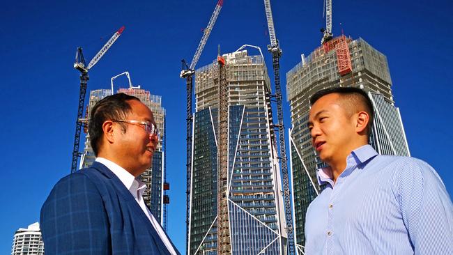 Xiangmo Huang and his son Jimmy Huang at the construction site for Jewel, which is now owned by their company Yuhu Group. Photo: Supplied