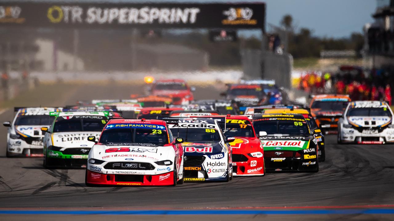 Will Davison (#23) leads the field into Turn 1 in race 22 at The Bend.