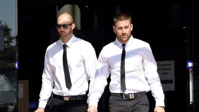 Josh Milani (left) and Sam Wallace leave the Southport courthouse in Southport on the Gold Coast in 2018. (AAP Image/Dave Hunt)