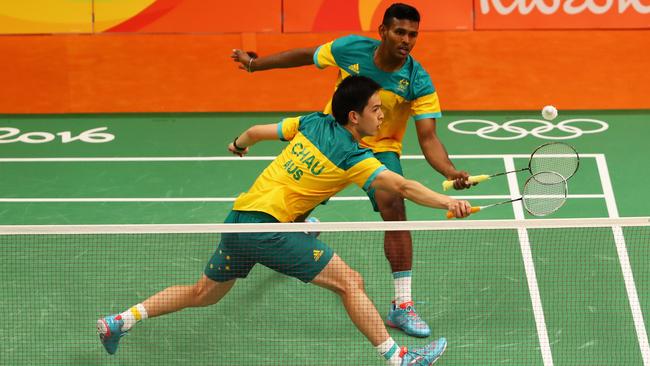 Matthew Chau and Sawan Serasinghe compete against South Korea in the badminton doubles.