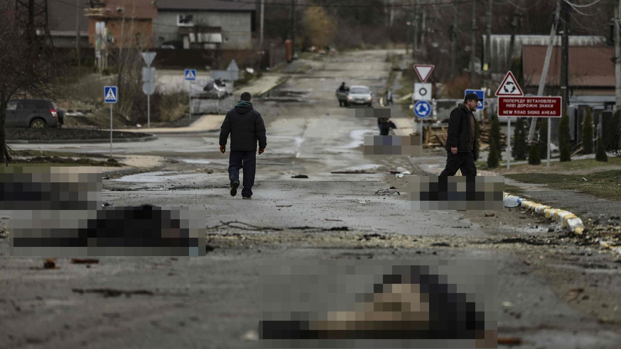 Multiple bodies lying on a street in Bucha. Picture: Ronaldo Schemidt/AFP