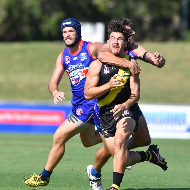 Callaway Parker tackled by a Thuringowa player. Picture: Evan Morgan