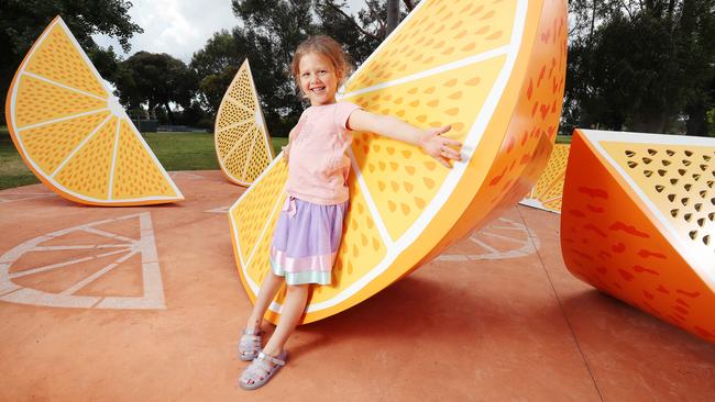 Winter, 6, with the ‘Half Time’ sculpture at Peterson Reserve, Highett. Picture: Rebecca Michael