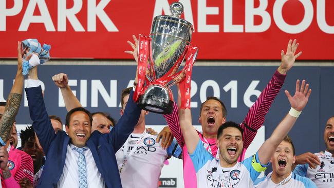 Melbourne City coach John van’ t Schip and captain Bruno Fornaroli hoist the FFA Cup in 2016. Picture: Getty Images