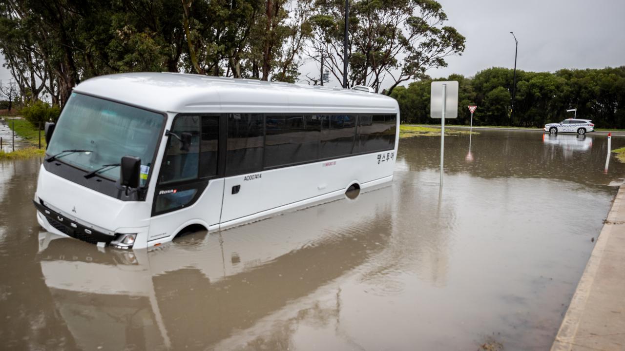 24 passengers evacuated after bus gets stuck in flood waters in Pakenham |  Herald Sun