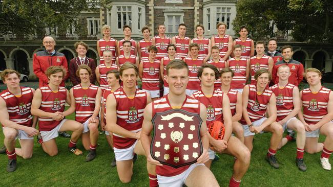 Captain Cole Gerloff holding the shield with his Prince Alfred College football team. Picture: AAP/Morgan Sette