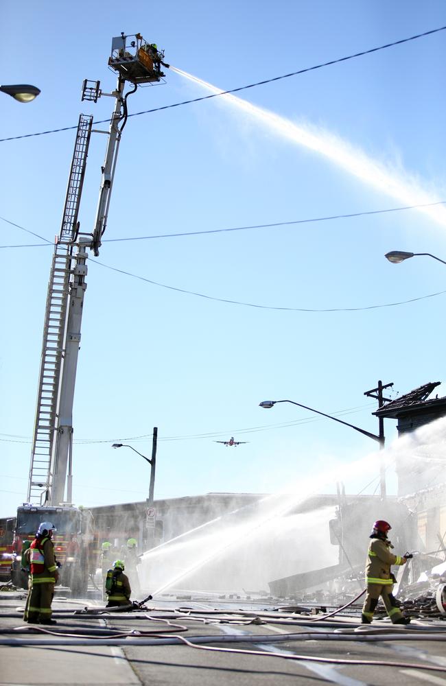 An aerial unit working to control the fire. Picture: Richard Dobson