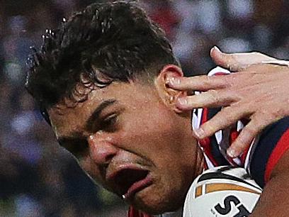 Roosters Latrell Mitchell scores a try during the 2018 NRL Grand Final between the Sydney Roosters and Melbourne Storm at ANZ Stadium, Sydney. Picture: Brett Costello