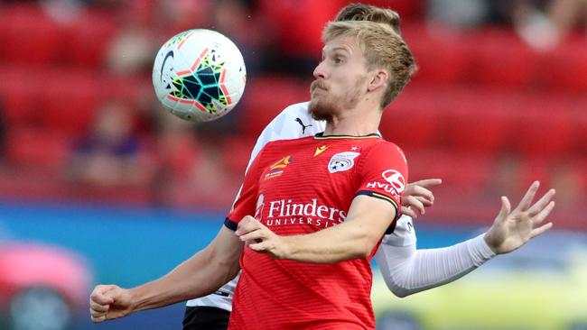 Ben Halloran of Adelaide United during the round-17 A-League against Melbourne City FC at Coopers Stadium on Saturday. Picture: Kelly Barnes/AAP