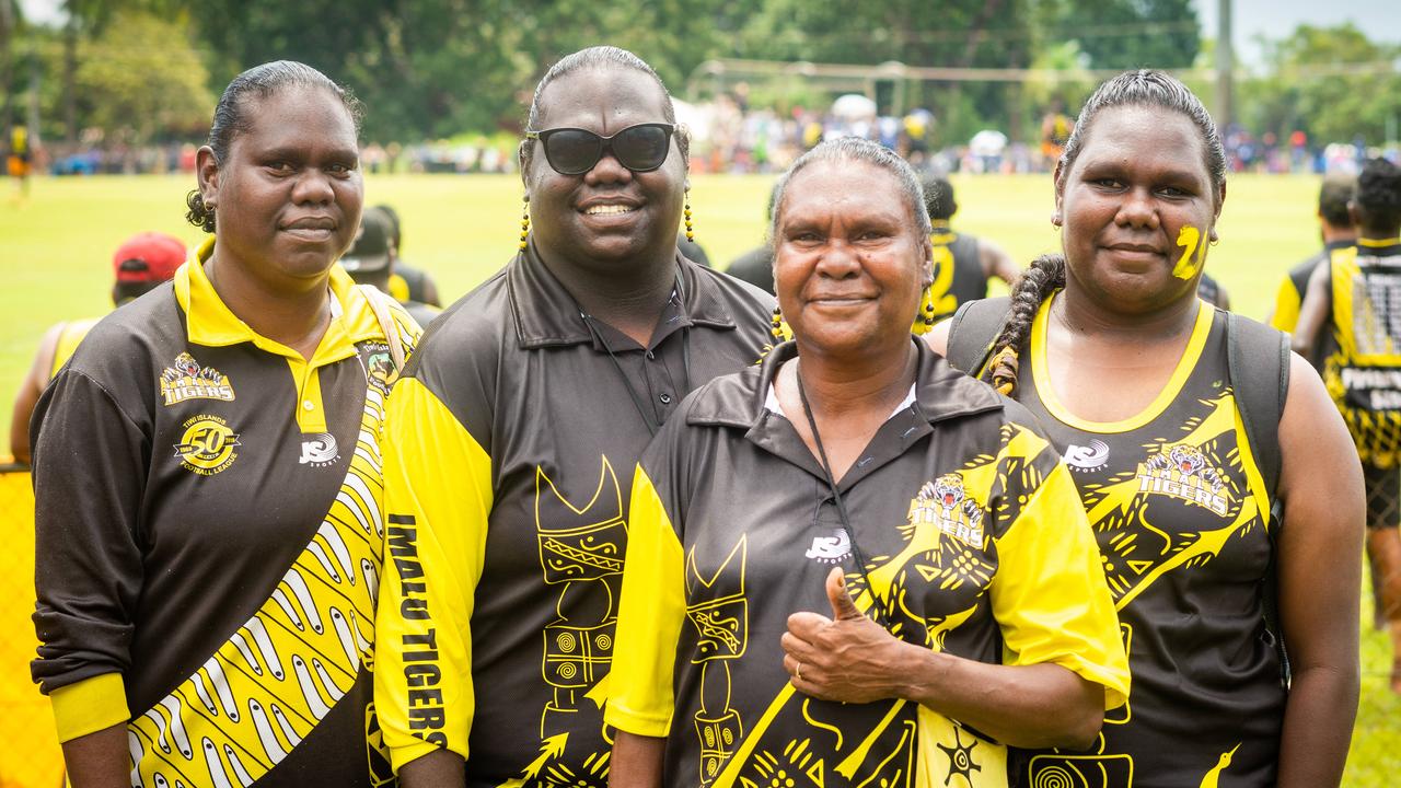 The Tiwi Islands 2020-2021 Grand Final. The Imalu Tigers take on the Walama Bulldogs on Bathurst Island. Tiger supporters Virgilia Puruntatameri, Gladys Puruntatameri, Lucia Puruntatameri and Edmena Johnson. Photograph: Che Chorley