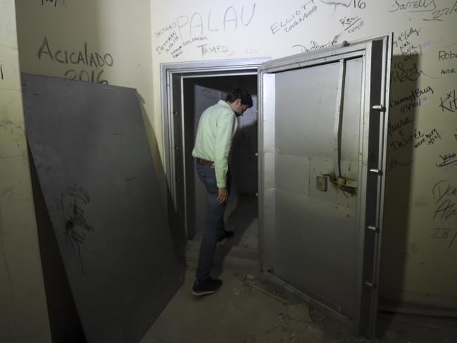 The Private Secretary of Medellin's Mayor's Office, Manuel Villa, visits the concrete Monaco building, which was once home to Colombian drug lord Pablo Escobar, in Medellin, Colombia. Picture: AFP