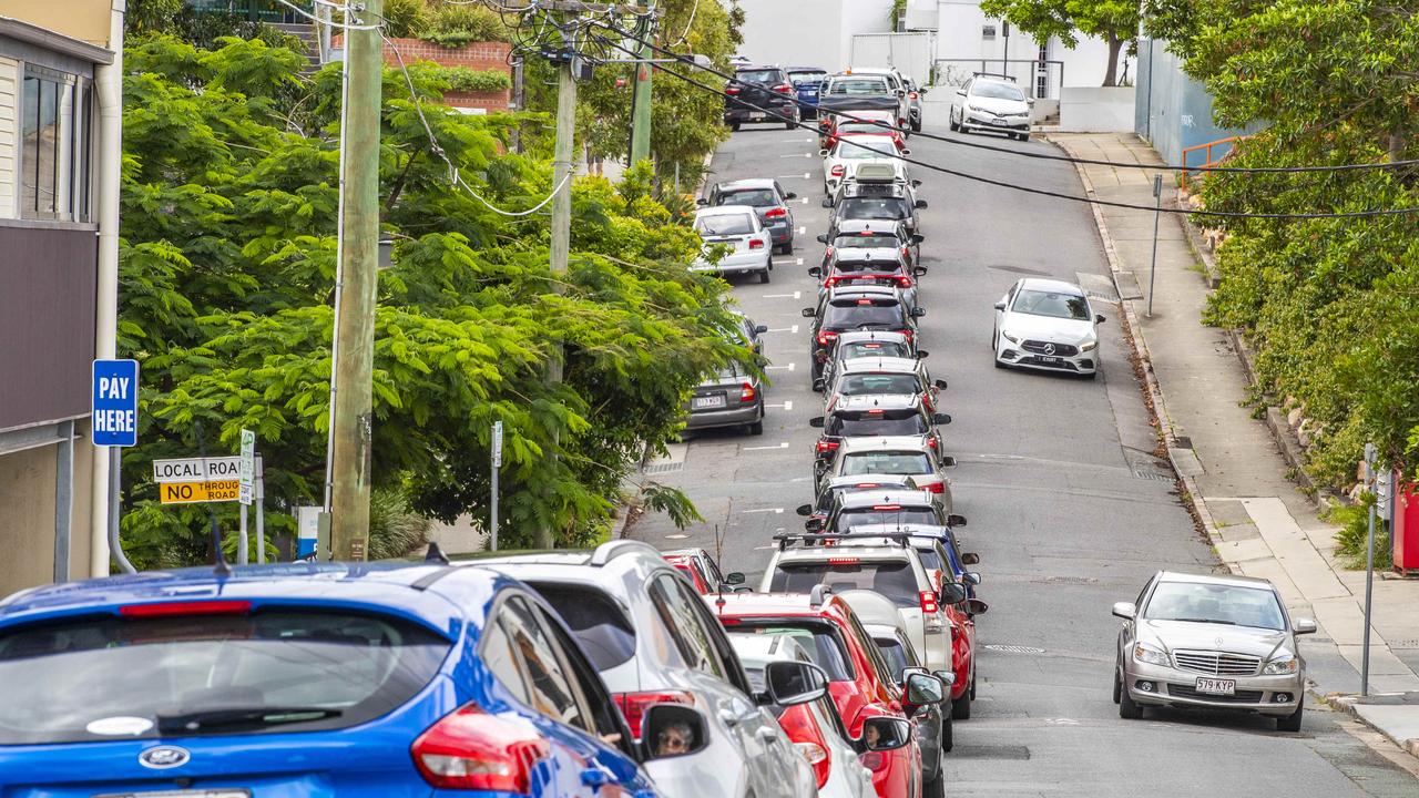 Traffic queues for COVID-19 drive through testing in Bowen Hills. Picture: Richard Walker