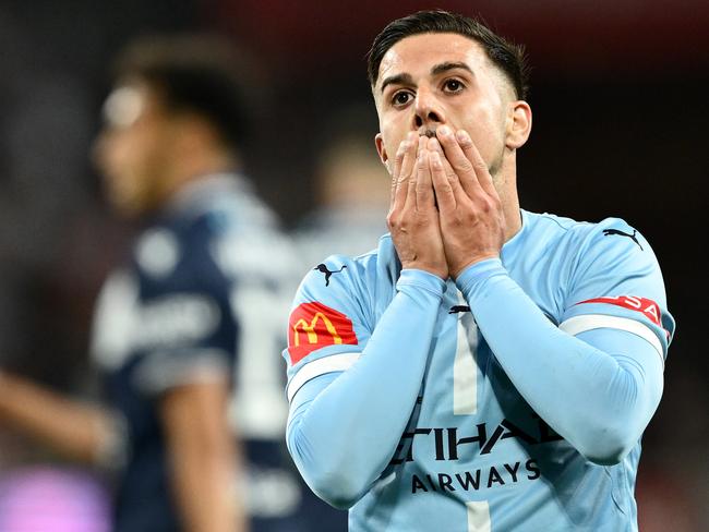 MELBOURNE, AUSTRALIA - OCTOBER 26: Marco Tilio of Melbourne City reacts after missing a shot on goal during the round two A-League Men match between Melbourne City and Melbourne Victory at AAMI Park, on October 26, 2024, in Melbourne, Australia. (Photo by Quinn Rooney/Getty Images)