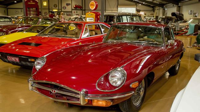 A Ferrari Dino 308 GT4 and 1969 Jaguar E-Type inside Gold Coast Motor Museum. Picture: Jerad Williams