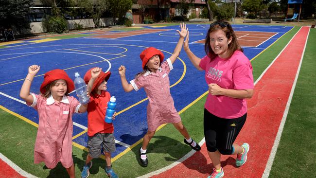 Principal of Spotswood Primary School Jackie Green will run a marathon in Paris on April 6th to raise money for a fence to surround the school on busy Melbourne Rd. Jackie with students Gale, Wes, and Siena.