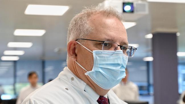 SYDNEY, AUSTRALIA – AUGUST 19: Prime Minister Scott Morrison takes a tour at the AstraZeneca laboratories in Macquarie Park, on Wednesday, after the Australian government has announced an agreement with the British pharmaceutical giant AstraZeneca to secure at least 25 million doses of a COVID-19 vaccine if it passes clinical trials. Picture: Nick Moir/Pool/Getty