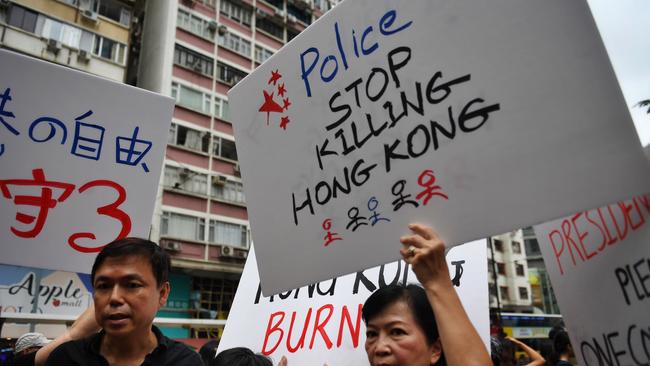 Protesters march near the Tin Hau MTR station in Hong Kong. Picture: AFP