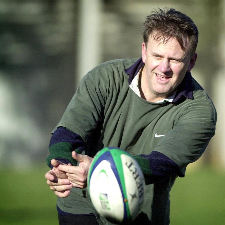 Mark Latham gets the ball away during politicians training session for the Parliamentary Cup rugby union series, in Canberra in 2003. Picture: Mark Graham. 