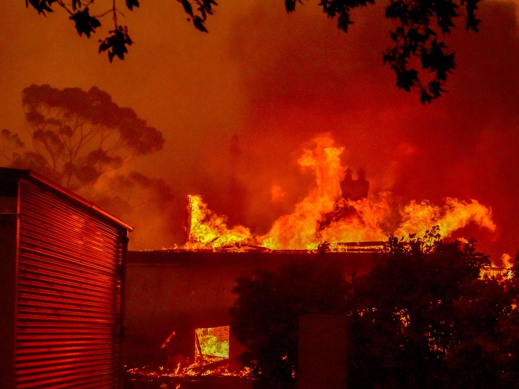 The Gospers Mountain fire continues to be listed at Emergency Warning Level. Tutti Frutti Fruit Shop on Bells Lin elf Road has been destroyed, along with the adjoining house and the neighbouring house. Several sheds have been damaged also. Picture: Matrix