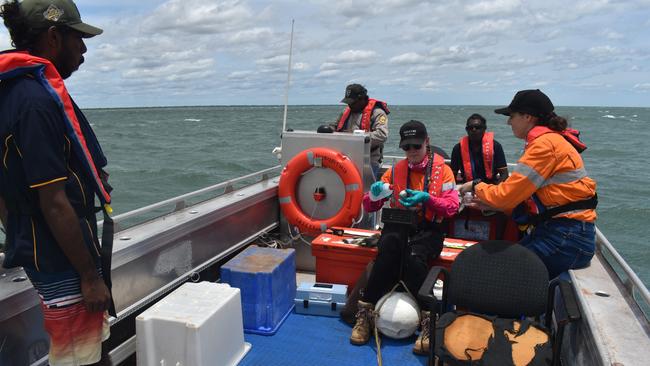 MRM’s Environment team works in partnership with the li-Anthawirriyarra Sea Ranger Unit to collect water samples. Picture: Supplied