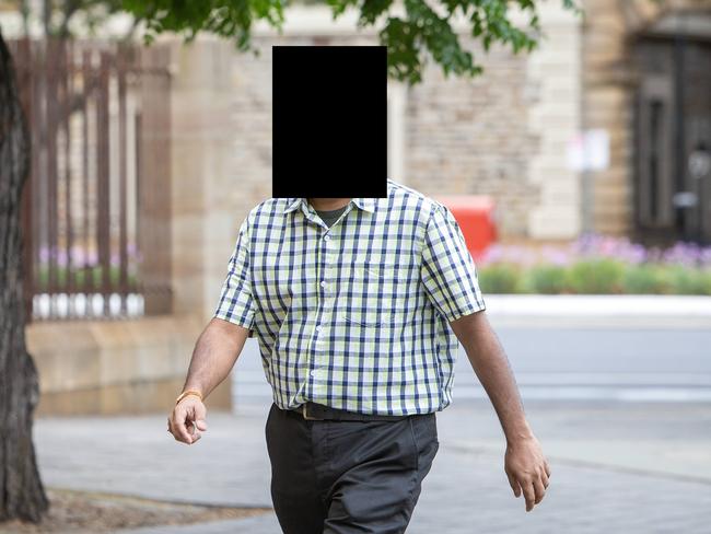 The man arrives at Adelaide Magistrates Court on Wednesday. The Glenelg masseur is charged with multiple sexual assault charges. Picture: NCA NewsWire / Emma Brasier