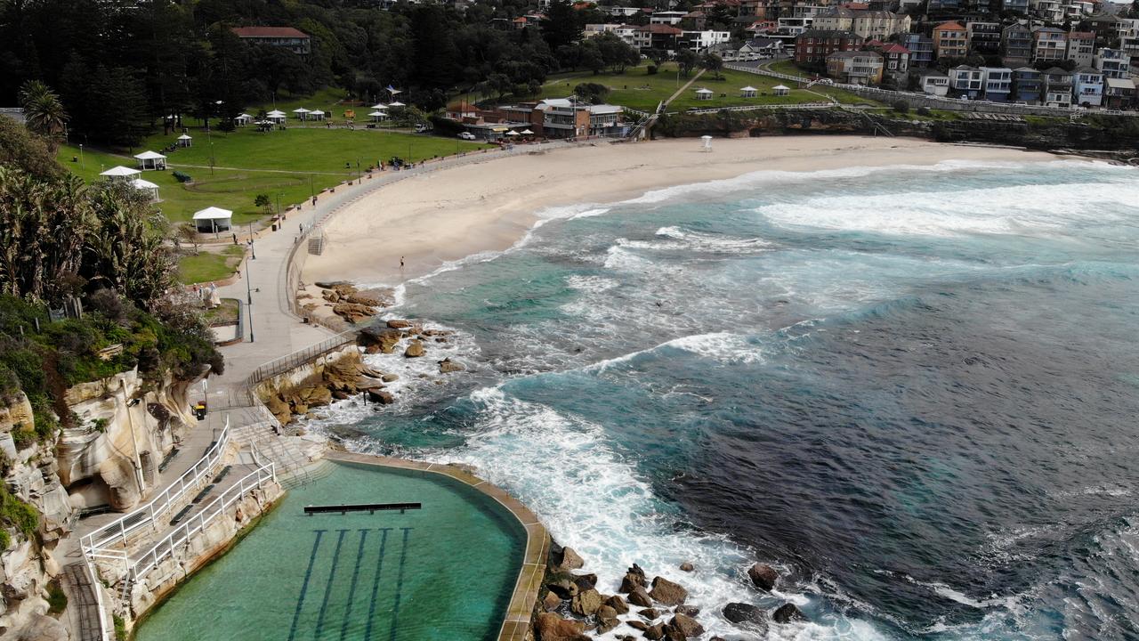 Bronte Beach is deserted, as can be seen from this drone image. Pictures: Toby Zerna