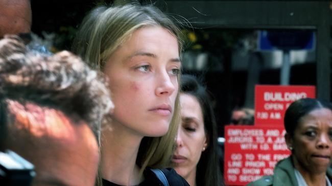 Actress Amber Heard after giving a sworn declaration that her husband Johnny Depp threw her cellphone at her during a fight, striking her cheek and eye. Picture: AP Photo/Richard Vogel,File