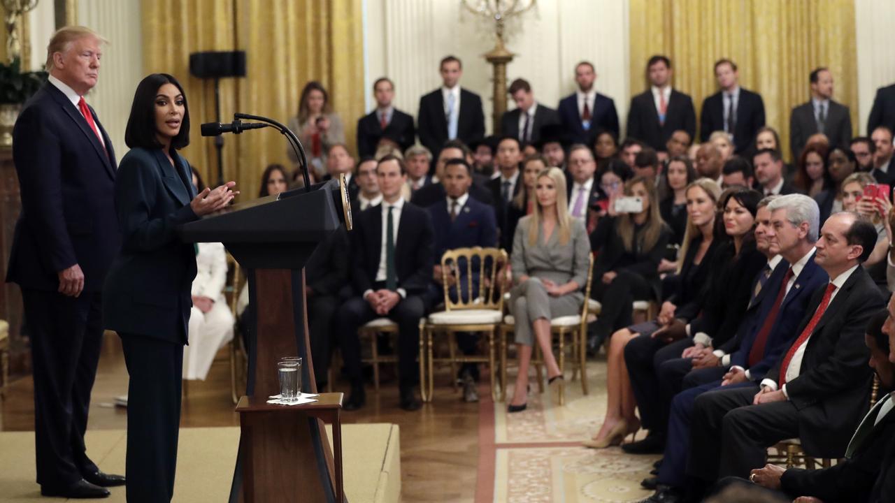 Donald Trump and Kim Kardashian on stage at the White House event. Picture: AP Photo/Evan Vucci