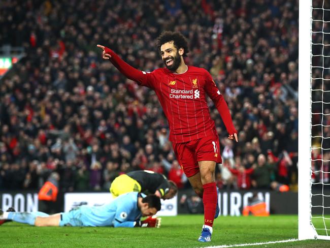 LIVERPOOL, ENGLAND - FEBRUARY 01: Mohamed Salah of Liverpool celebrates after scoring his team's fourth goal during the Premier League match between Liverpool FC and Southampton FC at Anfield on February 01, 2020 in Liverpool, United Kingdom. (Photo by Julian Finney/Getty Images) *** BESTPIX ***