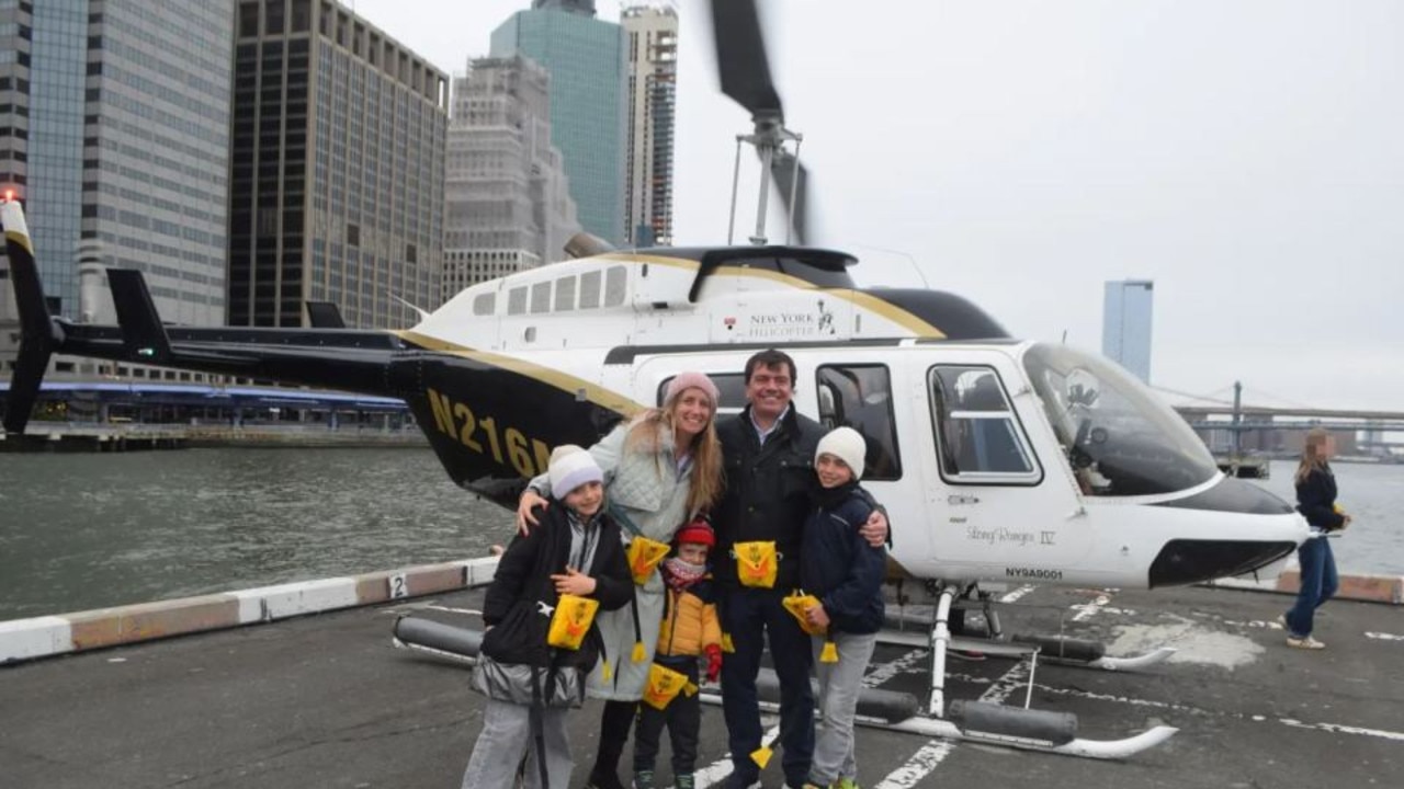 Escobar and his family beamed before boarding the helicopter. Picture: New York Helicopter Tours LLC