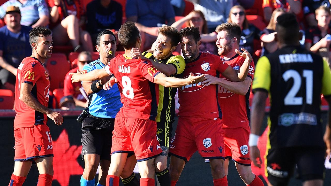 The players scuffle after the ugly incident.