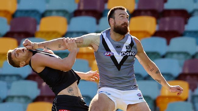 AFL Round 7. Carlton vs Port Adelaide at the Gabba, Brisbane. 19/07/2020.   Charlie Dixon of the Power gives away a free kick as he tries to hold Liam Jones of the Blues out of the marking contest q3  . Pic: Michael Klein